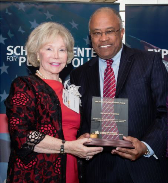 Nancy Grasmick and Kurt L. Schmoke with 2016 William Donald Schaefer Award Plaque