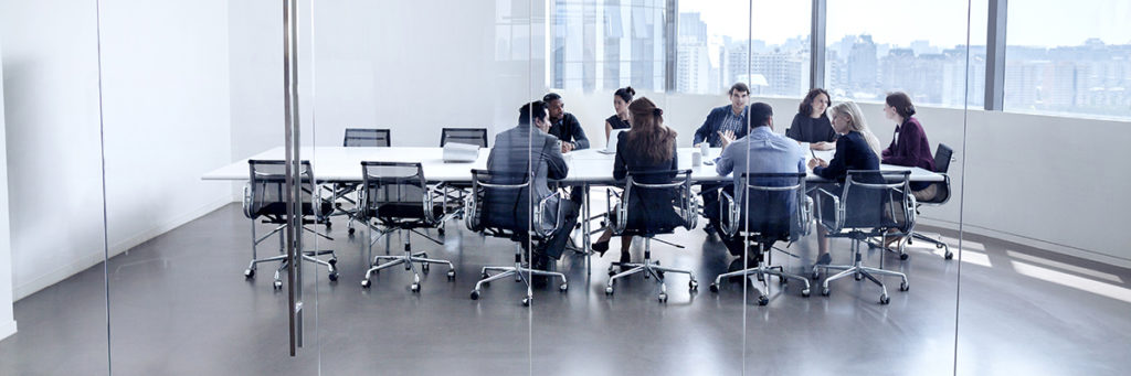 Colleagues at business meeting in conference room